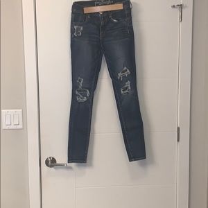 American eagle ripped dark wash jeans